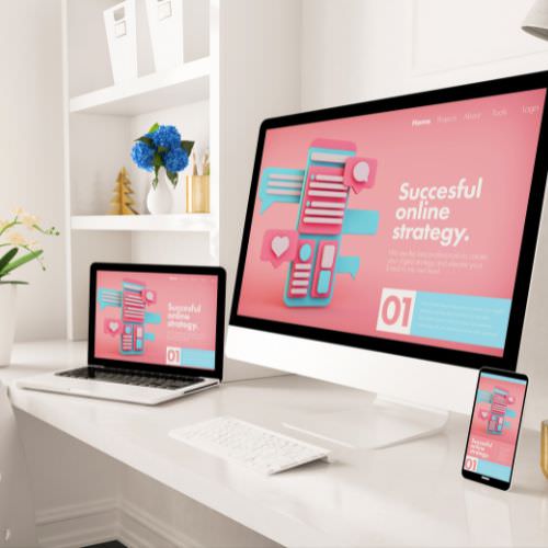 A mockup of a website on a computer and laptop.